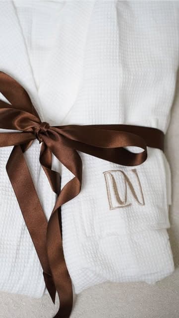 Soft clinic robe prepared for a private treatment appointment